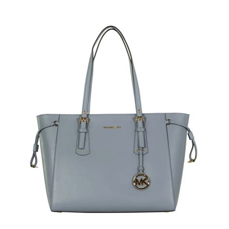 michael kors light blue bag.